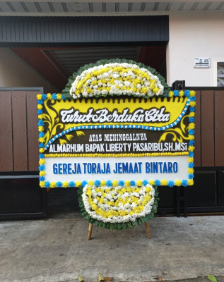 Papan Bunga Duka di Pinang Kencana